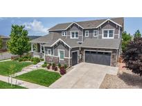 Beautiful two-story home with stone accents, manicured lawn and attached two car garage at 3891 W 149Th Ave, Broomfield, CO 80023