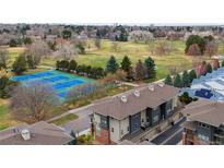 Inviting condo complex with a park, tennis courts, and soccer field at 188 S Locust St, Denver, CO 80224