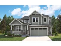Two-story home featuring stone accents, a covered front porch, and an attached two-car garage at 8386 Cokedale Cir, Littleton, CO 80125