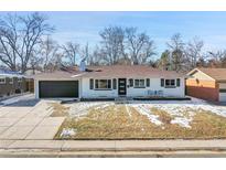 Ranch style home with modern updates and landscaped yard at 2681 S Newport St, Denver, CO 80224