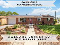 Charming brick home with solar panels, new windows, and a beautifully landscaped corner lot in Virginia Vale at 5593 E Center Ave, Denver, CO 80246