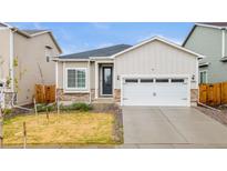 Charming single Gathering home featuring a 2-car garage and neutral toned exterior in an inviting community at 17801 E 95Th Pl, Commerce City, CO 80022