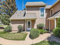 Charming exterior of home with manicured landscaping and inviting front entrance at 13598 E Asbury Dr, Aurora, CO 80014