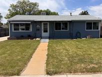 Charming single-story home with inviting front yard and walkway at 7291 Bryant St, Westminster, CO 80030