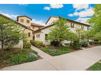 Beautiful building with well-manicured landscaping and a blue sky in the background at 10044 Martin Luther King Blvd, Denver, CO 80238