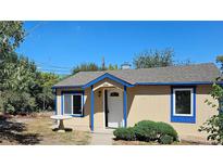 Charming home featuring a welcoming entrance and quaint front yard at 2941 W 55Th Ave Ave, Denver, CO 80221
