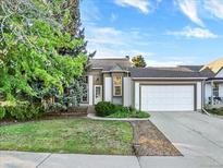 Charming single Gathering home with a two-car garage and mature landscaping at 19897 E Brunswick Dr, Aurora, CO 80013
