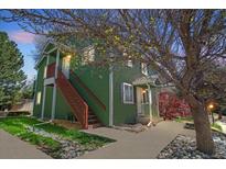 Charming two-story home with a private entrance and lush landscaping surrounding the property at 3228 W Girard Ave # C, Englewood, CO 80110
