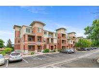 Inviting exterior of a multi-unit building with manicured landscaping and ample parking spaces at 4100 Albion St # 614, Denver, CO 80216