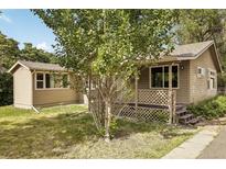 Ranch style home with detached shed and spacious yard at 180 S Lamar St, Lakewood, CO 80226