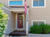 Inviting front entrance with a charming door and well-maintained landscaping at 7640 S Monaco W Cir, Centennial, CO 80112