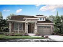 Craftsman style home with stone accents and a two-car garage at 10736 Snowdon St, Parker, CO 80134