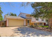 Charming two-story home with a large front yard and two-car garage, perfect for Gathering living at 2603 W 100Th Pl, Denver, CO 80260