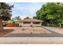 Charming single-story home featuring a low maintenance yard and driveway at 5635 Nebraska Way, Denver, CO 80224