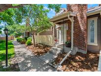 Charming front porch with brick facade and welcoming entrance at 2092 S Helena St # C, Aurora, CO 80013