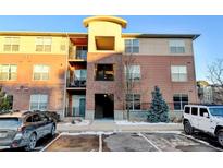 Brick apartment building with ample parking at 4100 Albion St # 504, Denver, CO 80216