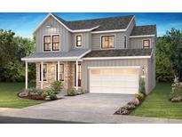 Two-story house with gray siding, stone accents, and a three-car garage at 8864 Moonshimmer Trl, Littleton, CO 80125