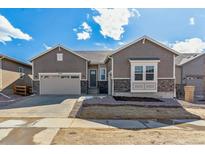 Charming single-Gathering home with a well-maintained lawn and a two-car garage at 24700 E 36Th Ave, Aurora, CO 80019