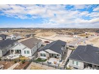 Desirable lot offering a spacious backyard with a patio surrounded by mountain views at 7202 Canyonpoint Rd, Castle Pines, CO 80108