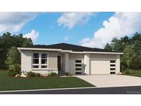 Charming single story home featuring a 3-car garage, neutral color palette, and beautifully landscaped front yard at 8672 Pennycress Dr, Littleton, CO 80125