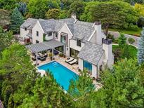 Luxury home with pool and landscaped grounds at 27 Polo Club Cir, Denver, CO 80209