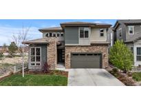 Stunning two-story home featuring stone accents, neutral siding and a two-car garage at 507 Red Thistle Dr, Highlands Ranch, CO 80126