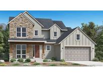 Inviting two-story home with stone accents, covered porch, and attached two car garage at 6299 Cristobal Pt, Parker, CO 80134
