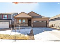 Beautiful single Gathering home with a well maintained lawn, a driveway and an attached garage at 2149 Indian Balsam Dr, Monument, CO 80132