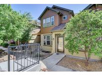 Charming two-story home with a well-manicured front yard, inviting curb appeal, and neutral exterior color scheme at 5887 S Taft Ln, Littleton, CO 80127