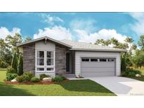 Charming single-story home featuring stone accents, a two-car garage, and manicured front lawn at 7067 E 126Th Pl, Thornton, CO 80602