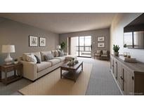 Inviting living room features a comfortable sectional sofa, neutral decor, and a sliding glass door at 13991 E Marina Dr # 505, Aurora, CO 80014