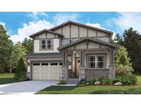 Charming two-story home with a covered porch, stone accents, and a two-car garage nestled in a lush landscape at 8223 Rockvale Dr, Littleton, CO 80125