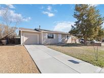 Charming single-story home featuring a one-car garage and long driveway at 3270 W 134Th Ave, Broomfield, CO 80020