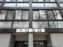 Exterior of building with visible address number, showcasing the entrance at 1050 N Corona St # 316, Denver, CO 80218