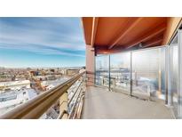 Enjoy the city views from this condo's private balcony with railing and partial glass enclosure at 100 Park W Ave # 1806, Denver, CO 80205