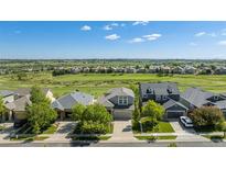 Charming two-story home with a well-manicured lawn and a view of the golf course and neighborhood at 11788 Mill Valley St, Parker, CO 80138