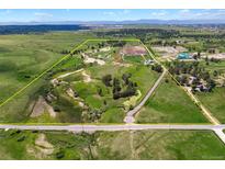 Expansive aerial view of a ranch property with a yellow boundary line at 2470 Driftwood, Elizabeth, CO 80107