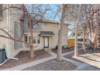 Charming townhome featuring a covered front entrance, landscaping, and a well-maintained exterior at 2249 Emery St # C3, Longmont, CO 80501
