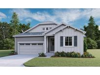 Charming one-story home with gray siding, manicured lawn, and attached two-car garage at 1352 Lumber Ridge N Cir, Erie, CO 80516