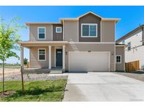 Charming two-story home featuring a two-car garage and covered front porch, great curb appeal at 4312 Gypsum Ave, Mead, CO 80504