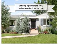 Charming exterior with well-maintained lawn and front yard landscaping at 3055 S Bannock St, Englewood, CO 80110