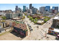 Panoramic aerial view of downtown Denver showcasing the city skyline and vibrant streetscape below at 2400 N Broadway # 4, Denver, CO 80205