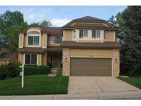 Charming two-story home with well-maintained landscaping at 7114 Mountain Brush Cir, Highlands Ranch, CO 80130