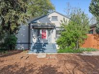 Charming single-Gathering home with landscaped front yard and welcoming entryway at 386 Colorado Blvd, Denver, CO 80206