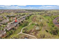 Beautiful home with lush green space and walking paths in a desirable neighborhood setting at 7829 S Coolidge Way, Aurora, CO 80016