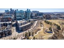 Panoramic aerial shot captures the city skyline, with park and winding paths in the foreground at 1700 Bassett St # 1106, Denver, CO 80202