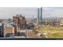 Stunning city view featuring high-rise buildings, a park, and the cityscape from a high-rise condominium at 1700 Bassett St # 1106, Denver, CO 80202