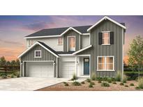 Charming two-story home with a three-car garage and beautiful landscaping at 3994 Breakcamp Ct, Castle Rock, CO 80108