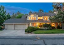 Charming two-story home boasting a three-car garage and beautiful landscaping, perfect for suburban living at 5063 E Otero Cir, Centennial, CO 80122