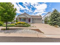 Charming single-Gathering home featuring a well-manicured lawn and two-car garage at 5403 Odessa St, Denver, CO 80249